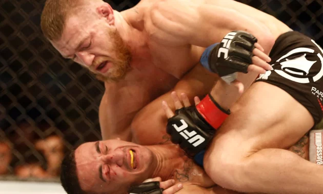 McGregor Suffers Knee Injury in Shocking UFC 329 Upset, Loses to Max Holloway